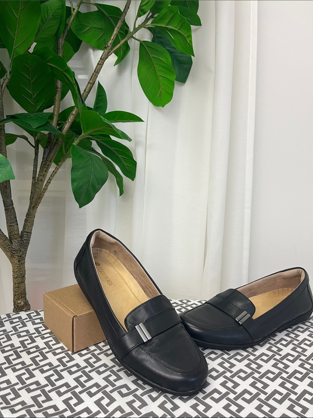 Black Leather Slip-On Loafers with Silver Accent